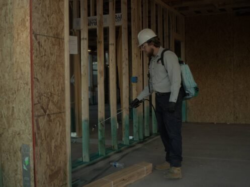 Man sprays new house