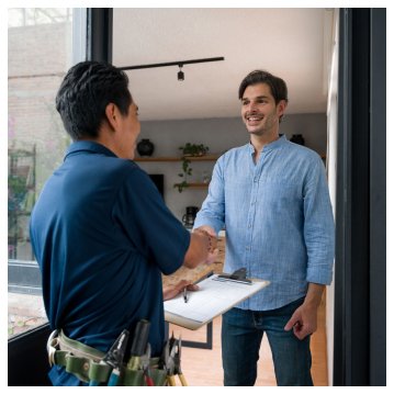 technician shaking a home owners hand at the front door